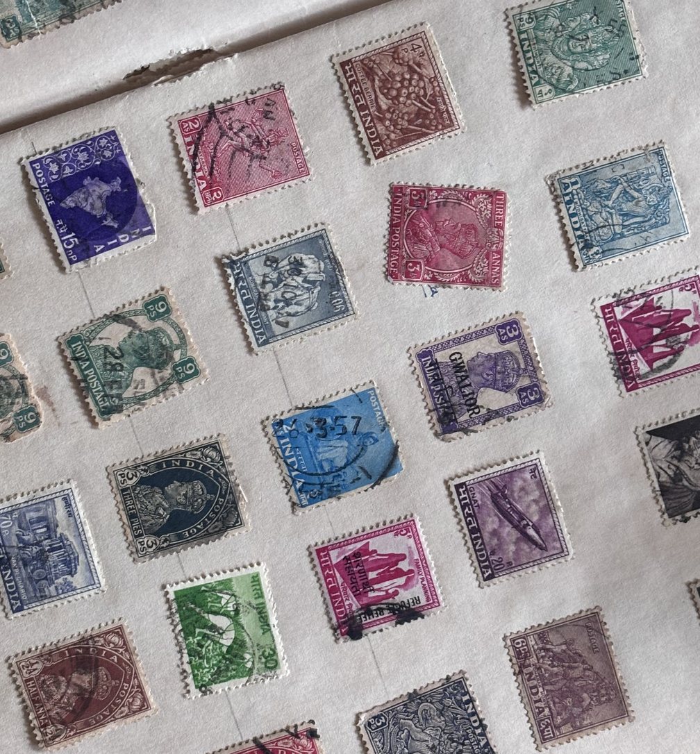A page of an old album: Indian stamps of the 1940s and 50s mounted in diagonal rows