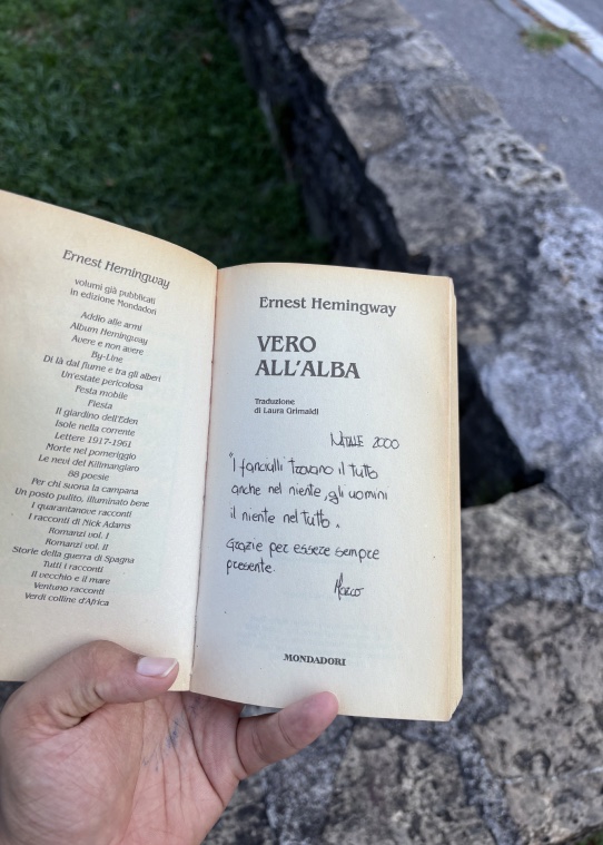 The first page of the book with a handwritten note